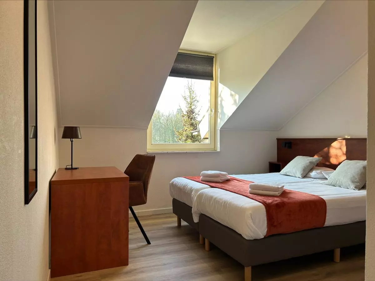 Groepsaccommodatie met éénpersoons kamers met eigen badkamer